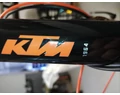 KTM X-Life Track férfi cross kerékpár 24 fokozatú Acera váltó, hidraulikus tárcsafék, fényes fekete-narancs 60cm