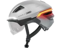 Abus HYP-E ACE kerékpáros bukósisak első és hátsó világítással index jelzővel mágneses lencsével gleam silver S (51-55cm)