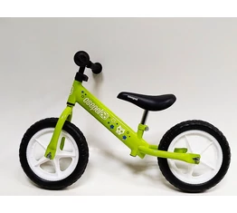 Csepel futóbicikli fém vázas, tömör kerekű, zöld színű, oroszlán mintával