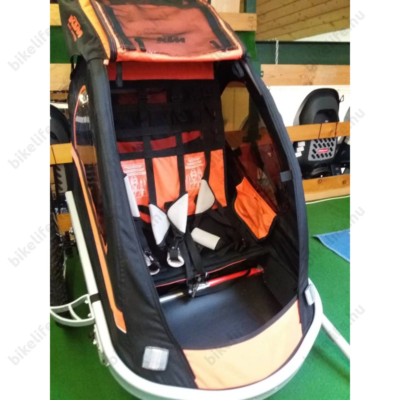 KTM Carry gyermek szállító utánfutó, 2 gyermeknek, 45kg terhelhetőség, időjárás álló boritás
