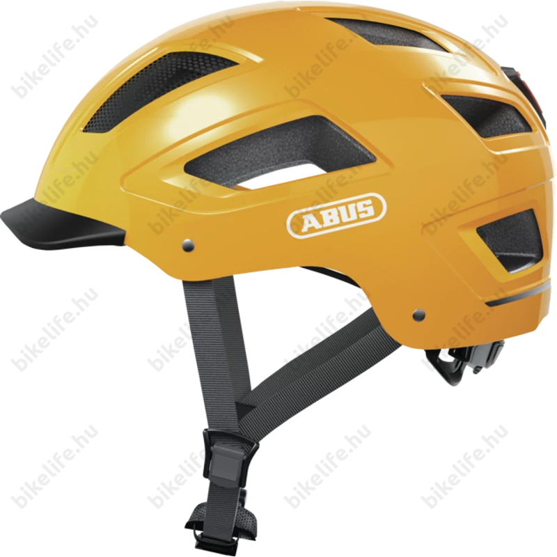 Abus Hyban 2.0 kerékpáros bukósisak beépített villogóval sárga M-es (52-58cm)