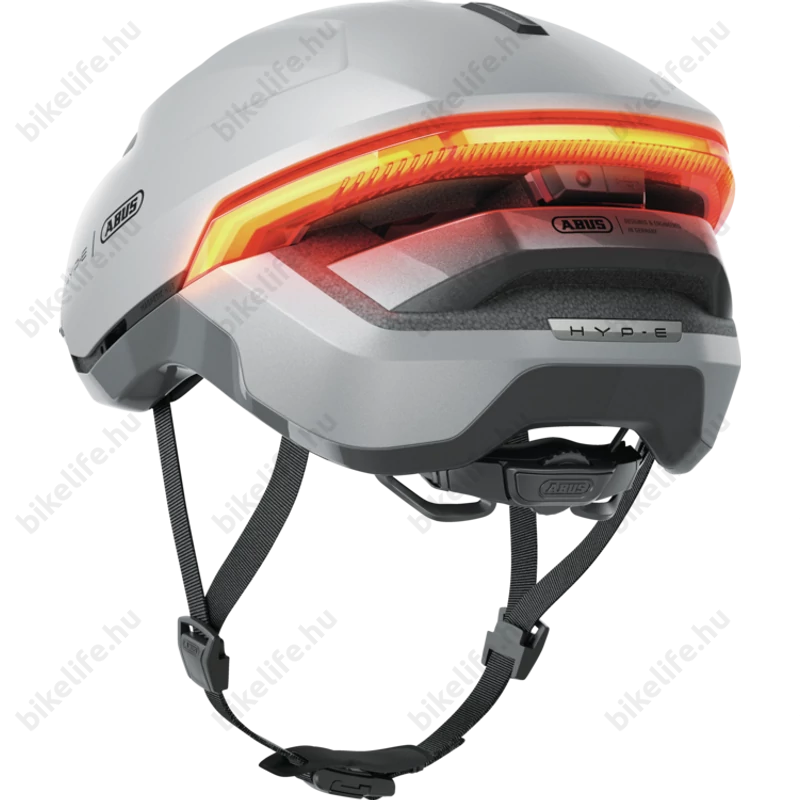 Abus HYP-E kerékpáros bukósisak első és hátsó világítással index jelzővel gleam silver S (51-55cm)