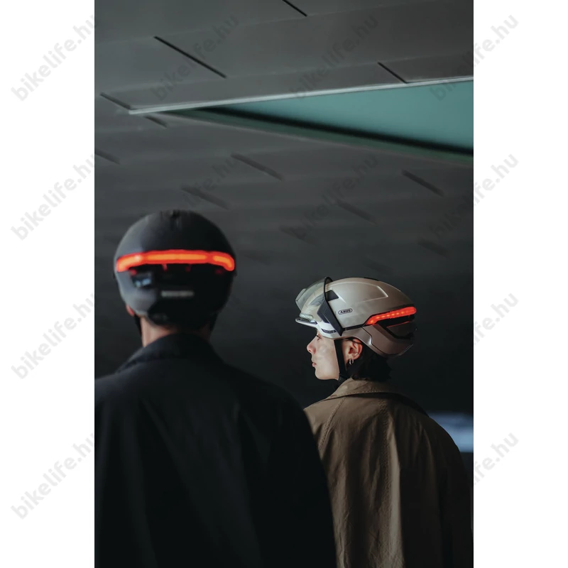 Abus HYP-E kerékpáros bukósisak első és hátsó világítással index jelzővel gleam silver M (54-58cm)