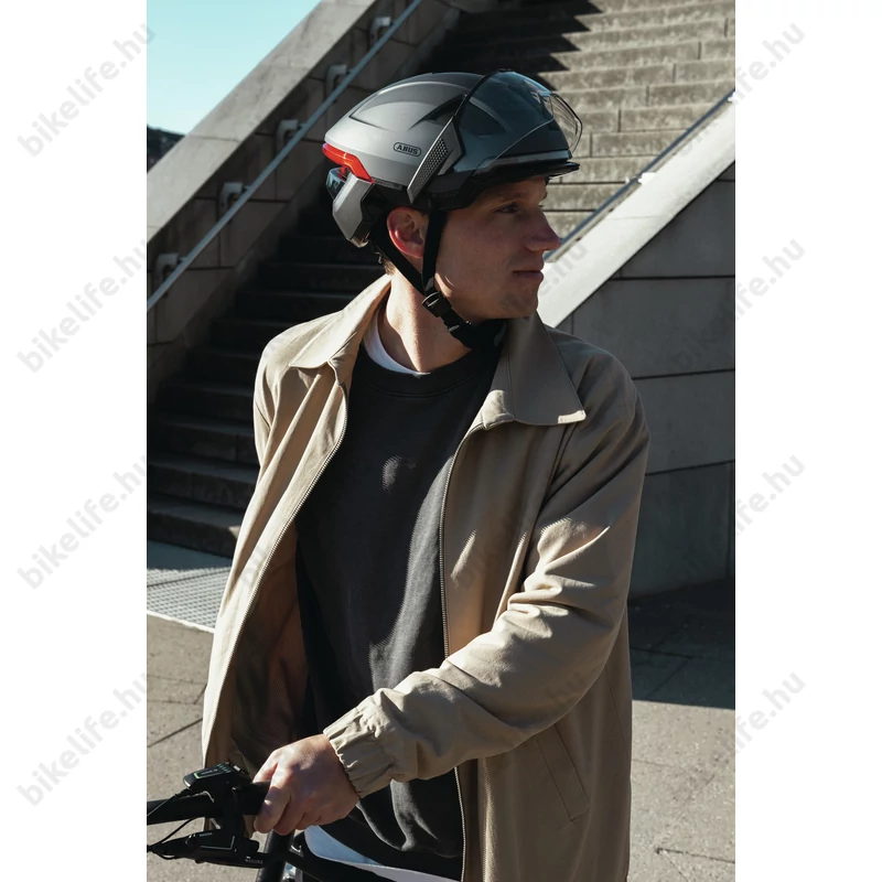 Abus HYP-E ACE kerékpáros bukósisak első és hátsó világítással index jelzővel mágneses lencsével volcano titán S (51-55cm)