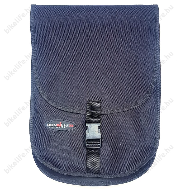 Ha felhajtjuk a fedelet válik láthatóvá a heveder, emin állítható a csat